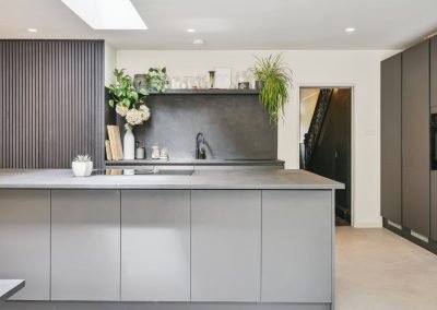 Microcement kitchen island worktop & floor by C Ferri Interiors, London